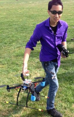 Chris Vo holds a drone at the DC DUG Fly-in.