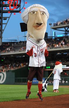 Aug 9, 2013; Washington, DC, USA; Thomas Jefferson mascot dances during the game between the Washington Nationals and the Philadelphia Phillies at Nationals Park. Mandatory Credit: Brad Mills-USA TODAY Sports