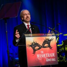 Attain LLC Chairman and CEO Greg J. Baroni receives the Outstanding Achievement Award at the 2016 National Kidney Foundation's Masquerade Ball